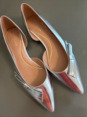 Cole Haan Metallic Silver Pointed-Toe Bow Flats.